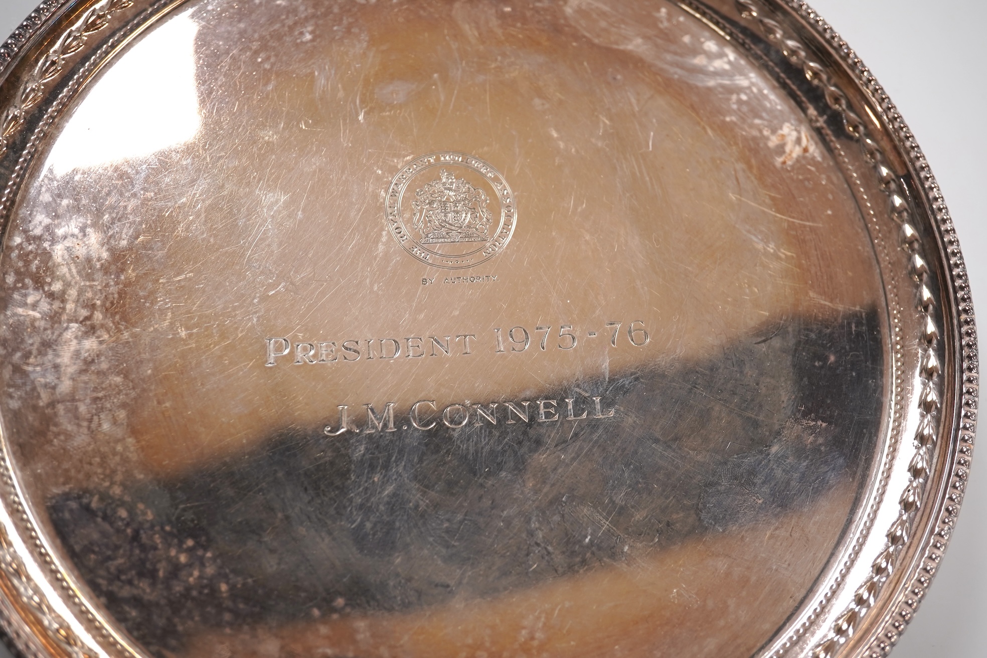 An Elizabeth II silver salver by Garrard & Co Ltd, London, 1975, with engraved inscription, diameter 20.2cm, 10.8oz.